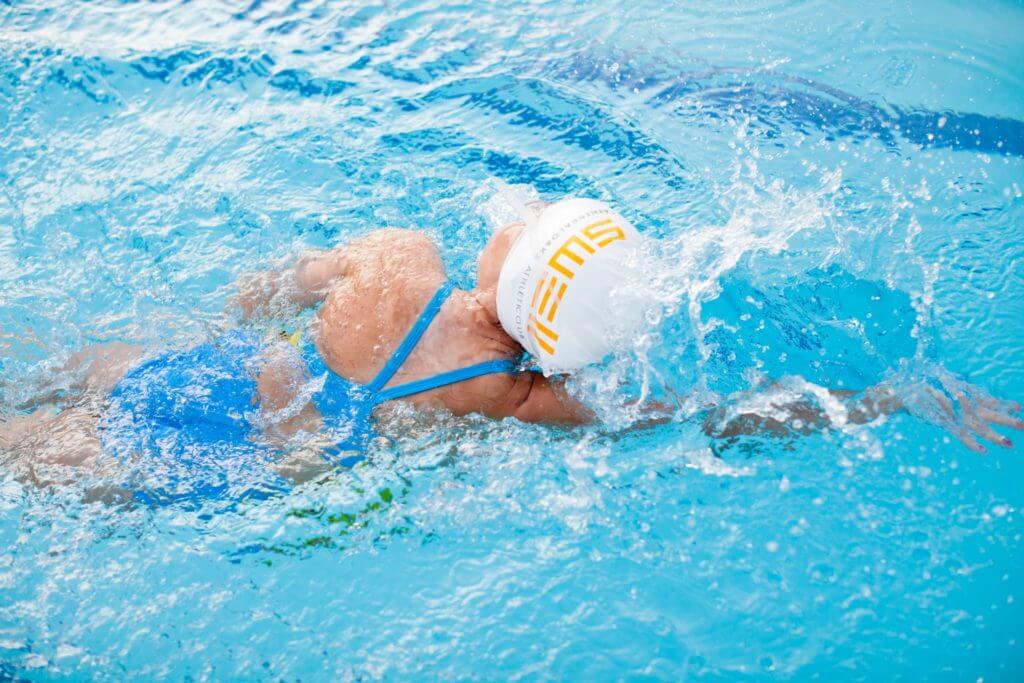 Person swimming at Cathedral Oaks Athletic Club in Goleta, Santa Barbara, California, 93117