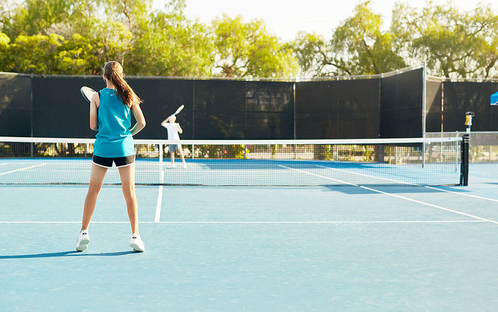 Kids play tennis at Cathedral Oaks Athletic Club